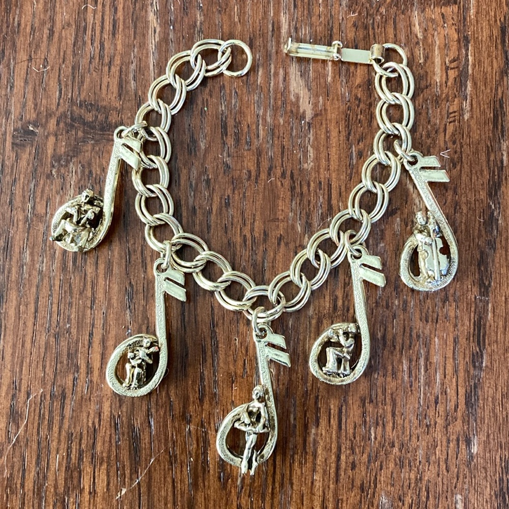Music-themed vintage charm bracelet
